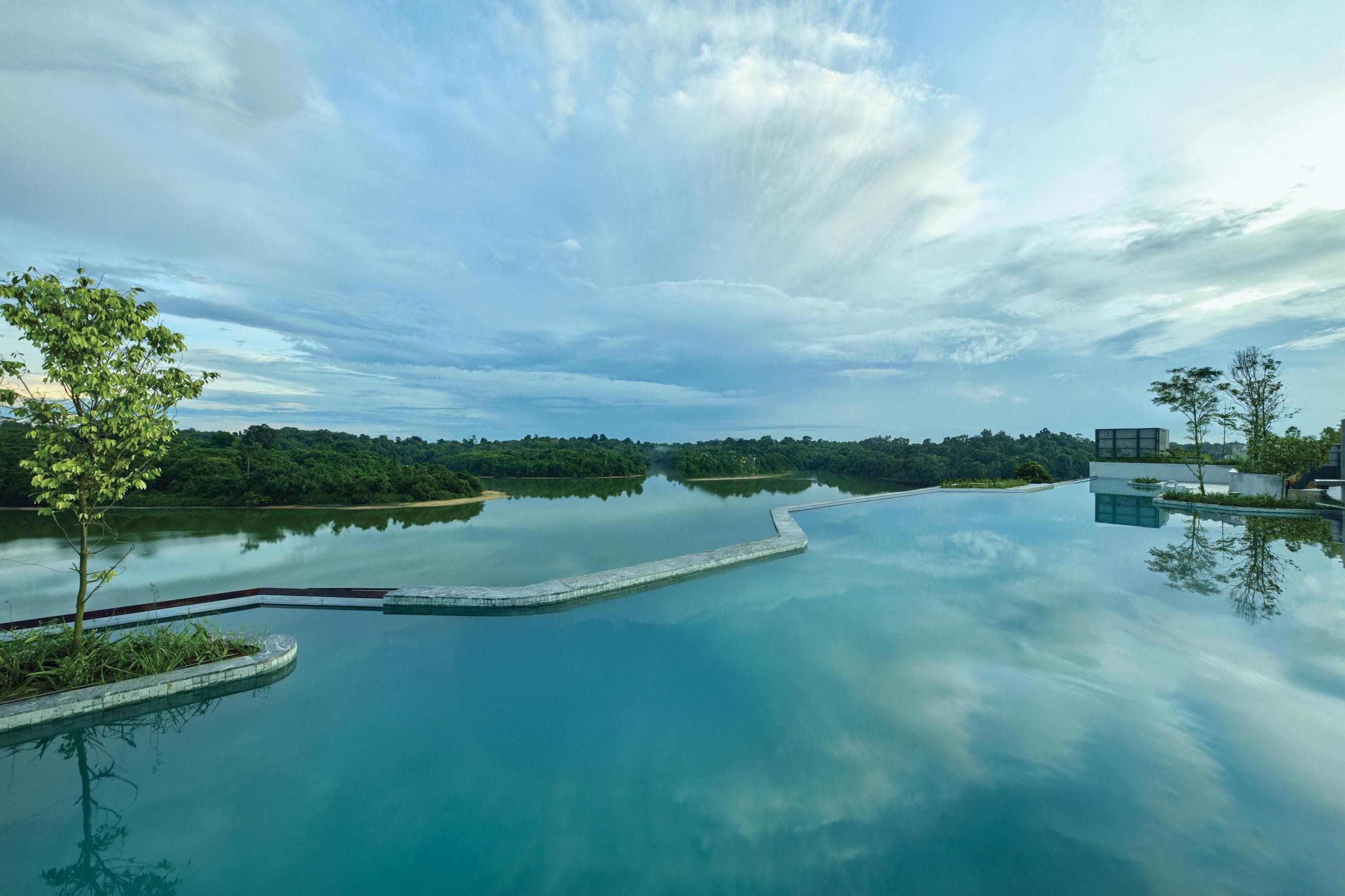 Aerial view of the reservoir and rainforest surrounding the resort